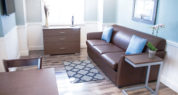 Pelican Cottage living room has a sleeper sofa.